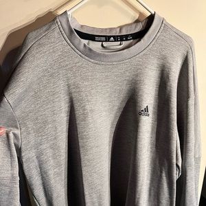 I am selling a XXL silver/grey sweatshirt that is a crewneck. In good condition.